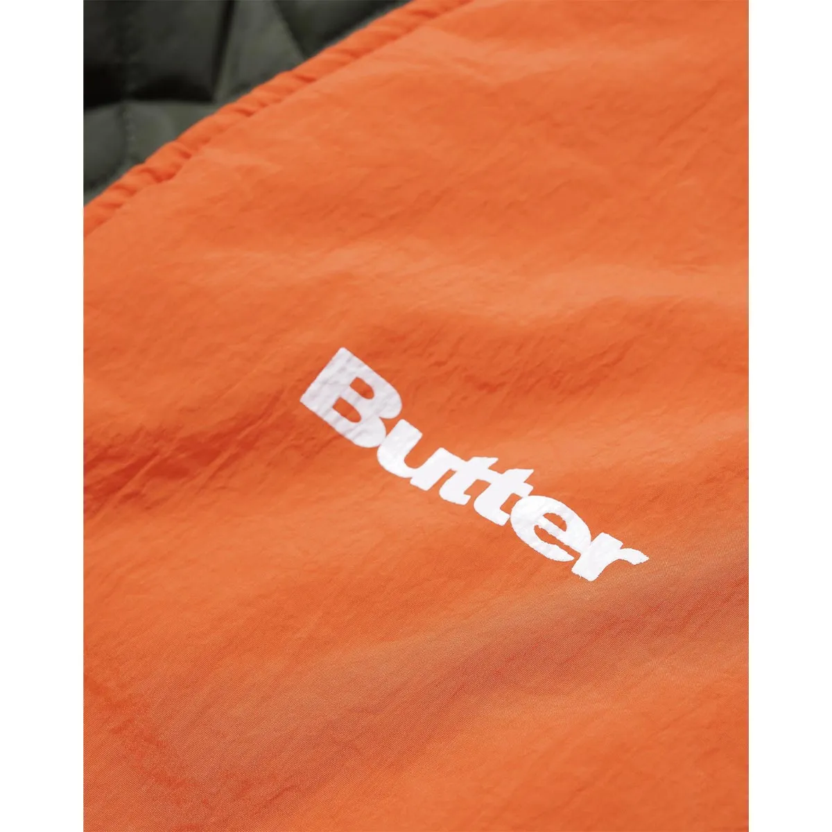 Butter Goods - Chainlink Reversible Puffer Vest Army/Orange