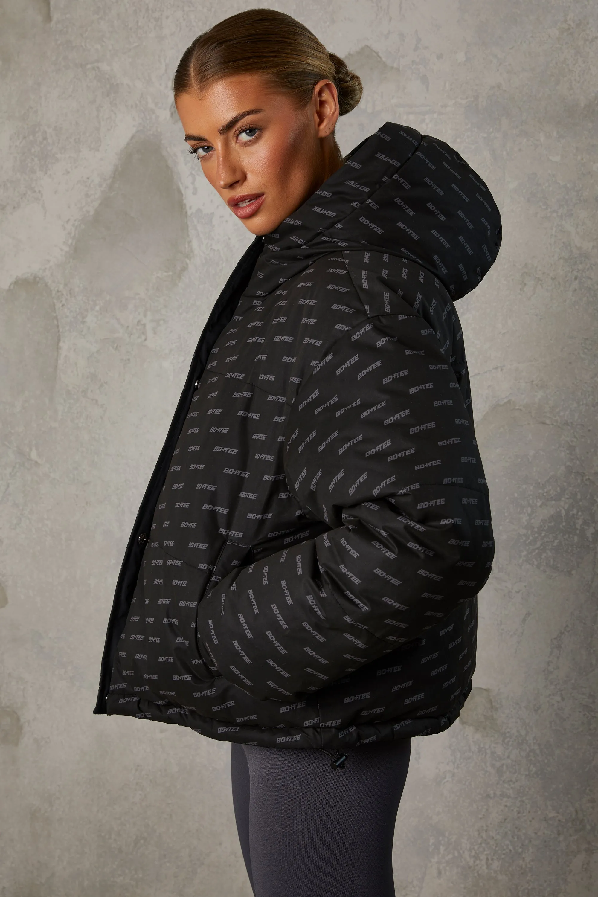 Layer Up - Reversible Hooded Puffer Jacket in Black