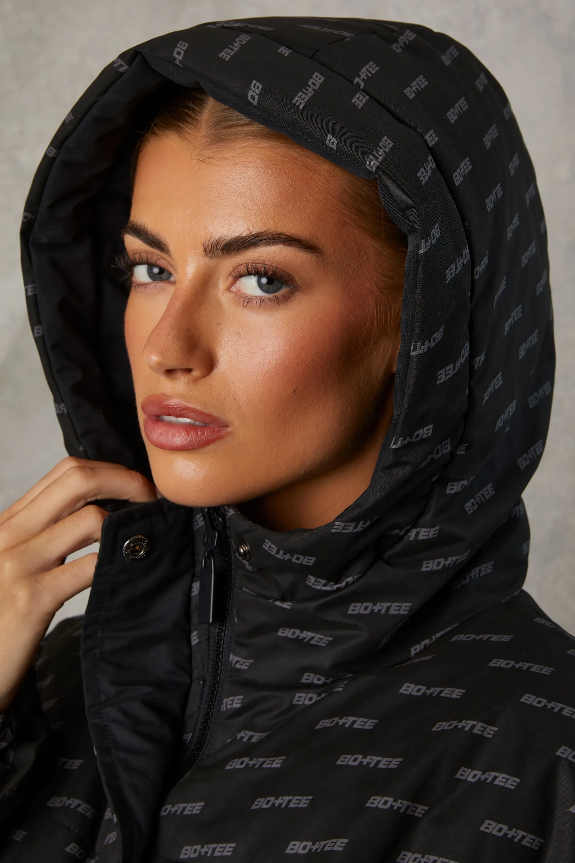 Layer Up - Reversible Hooded Puffer Jacket in Black