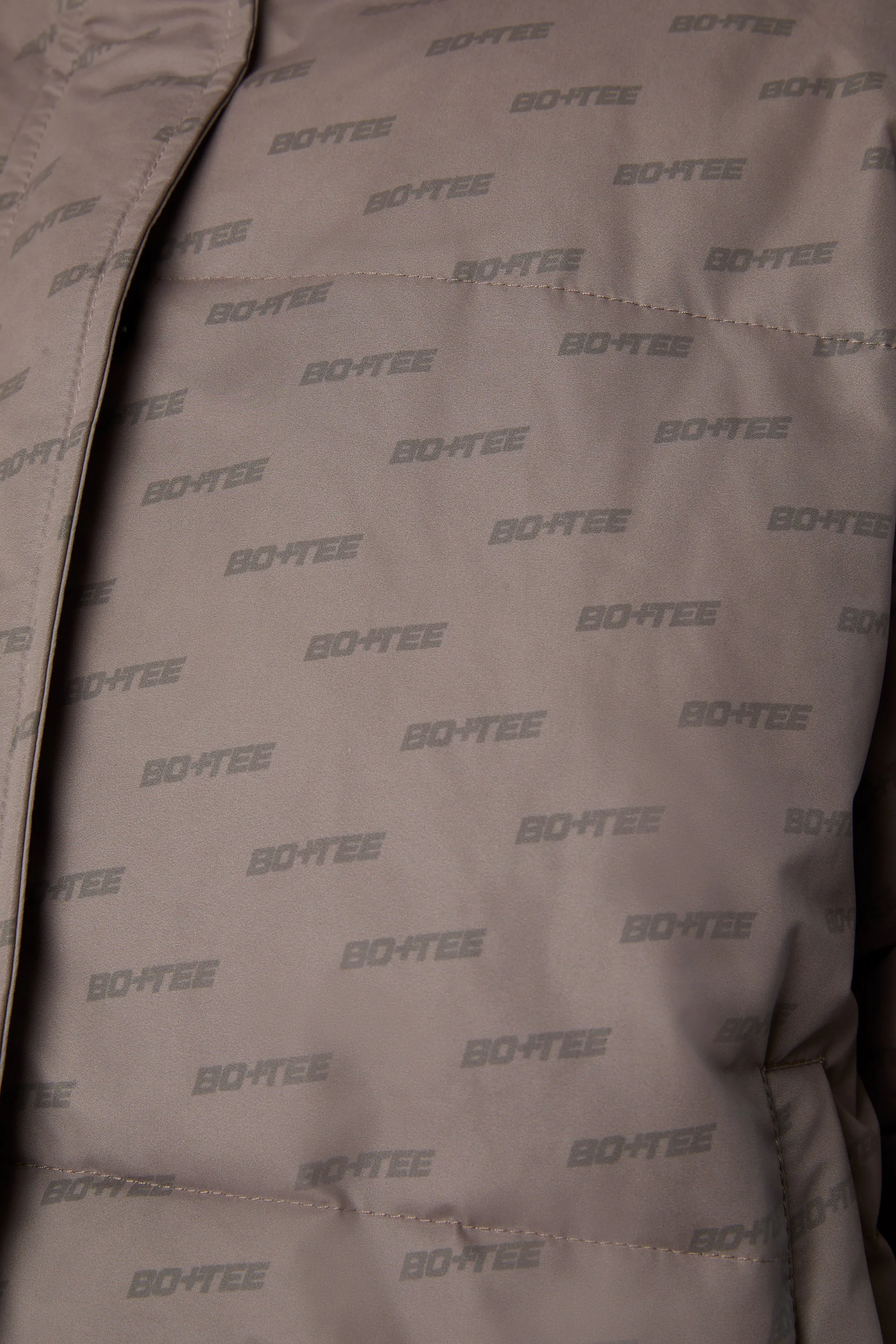 Layer Up - Reversible Hooded Puffer Jacket in Warm Grey