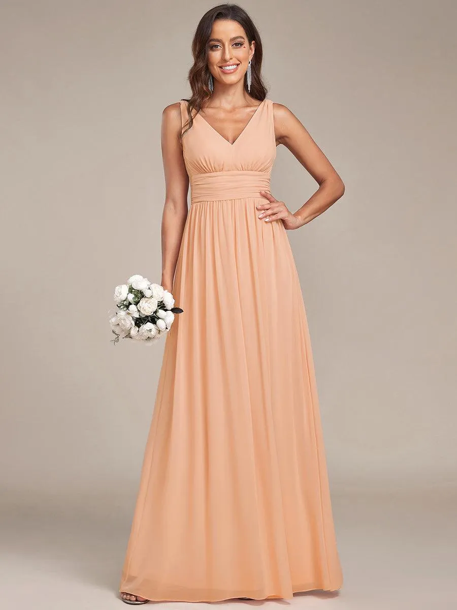 Robe en mousseline de soie sans manches à col en V