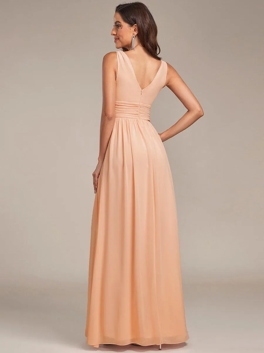 Robe en mousseline de soie sans manches à col en V