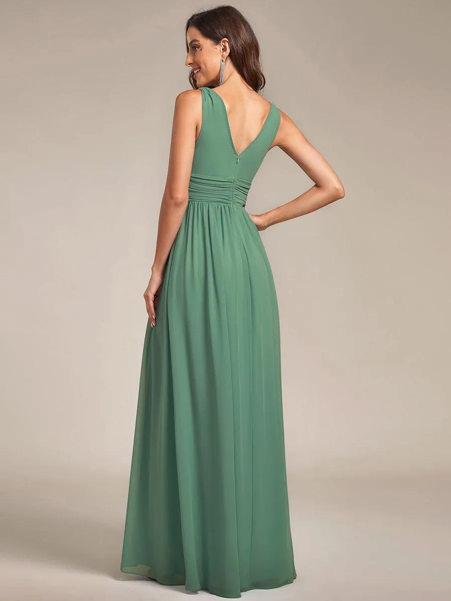 Robe en mousseline de soie sans manches à col en V